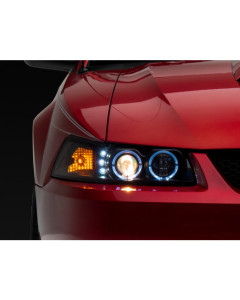 Raxiom 99-04 Ford Mustang Dual LED Halo Projector Headlights- Black Housing (Clear Lens)