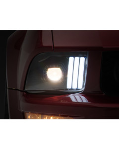 Raxiom 05-09 Ford Mustang w/ Halogen Prjctor Headlights- Black Housing (Clear Lens) (No GT500 )