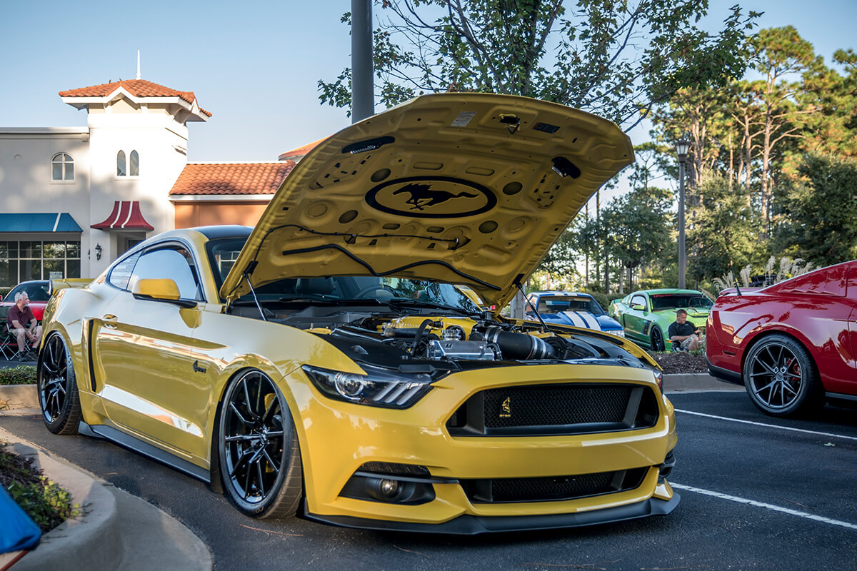 yellow s550 ford mustang car show